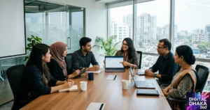 A Digital Dhaka 360 image, featuring male and female professionals discussing data on a laptop screen with clients.